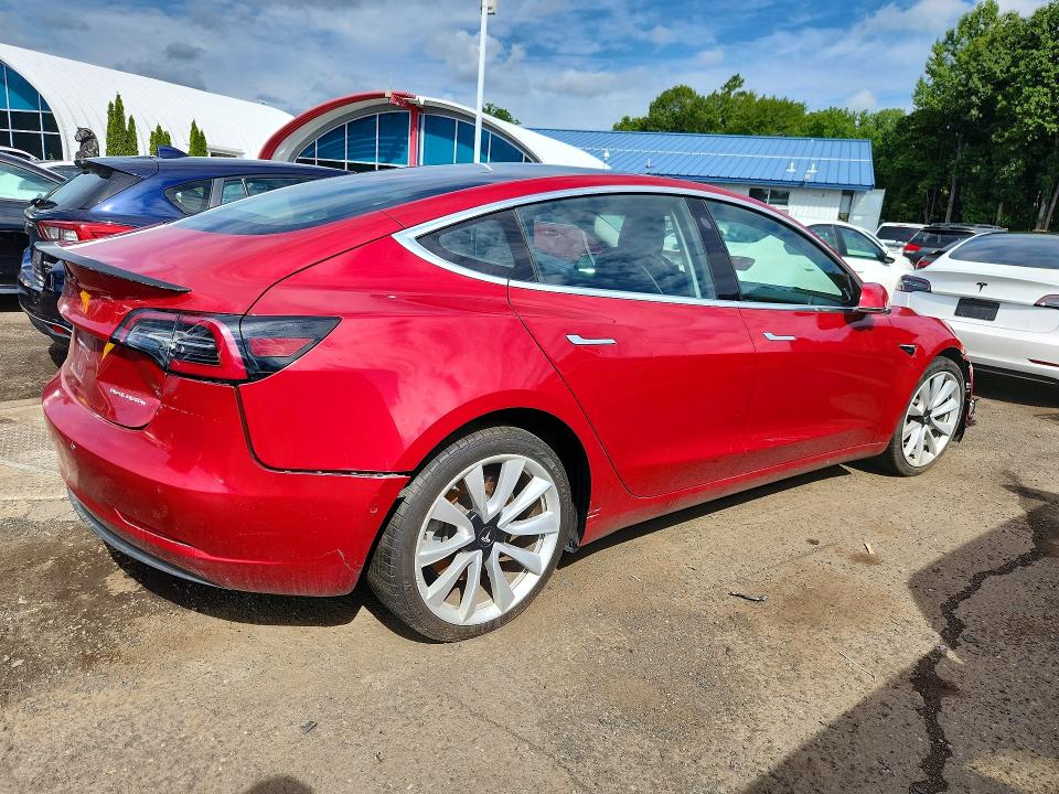 Photo 3 from auction – 2018 TESLA MODEL 3 with VIN 5YJ3E1EB5JF146136