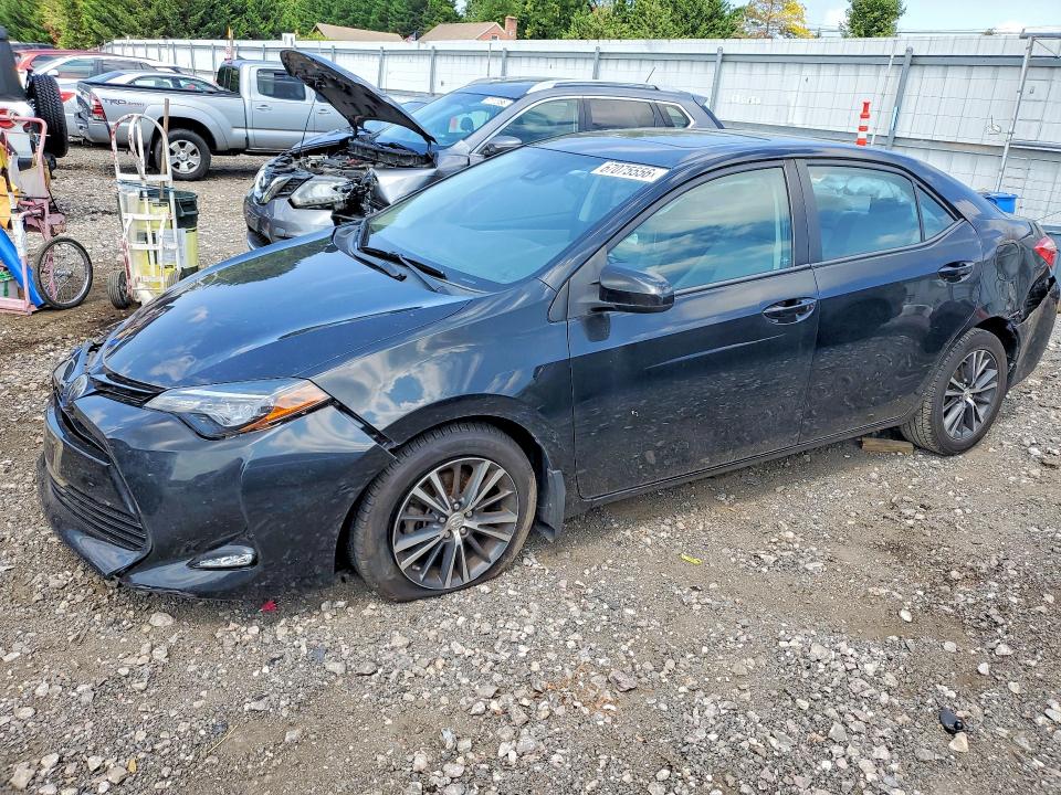 TOYOTA COROLLA 2017 with VIN 2T1BURHE3HC933684 - Photo from auction
