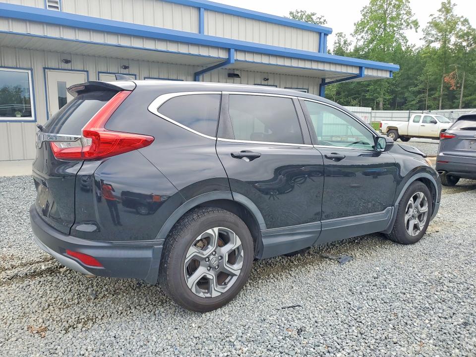 Photo 3 from auction – 2018 HONDA CR-V with VIN 5J6RW1H55JA000612