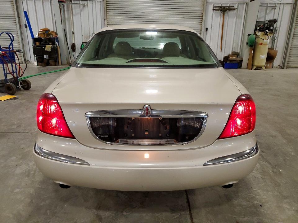 Photo 6 from auction – 2002 LINCOLN CONTINENTAL with VIN 1LNHM97V12Y650694