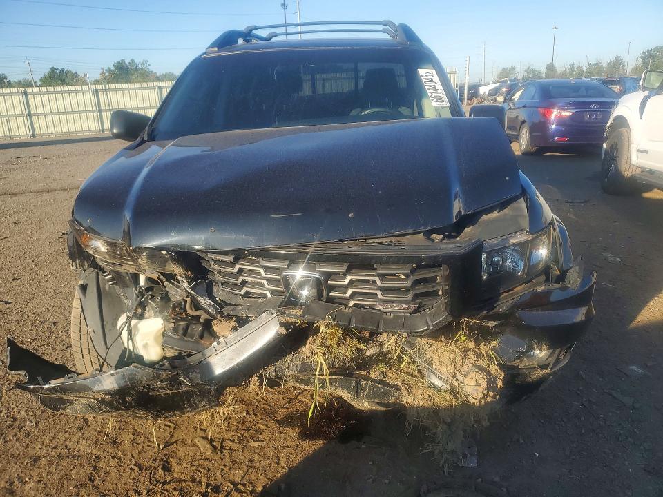 Photo 5 from auction – 2013 HONDA RIDGELINE with VIN 5FPYK1F79DB001573