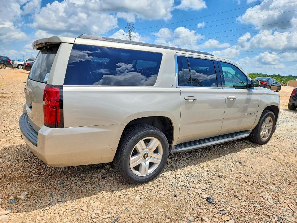 Photo 3 from auction – 2015 CHEVROLET SUBURBAN with VIN 1GNSCJKC4FR578269