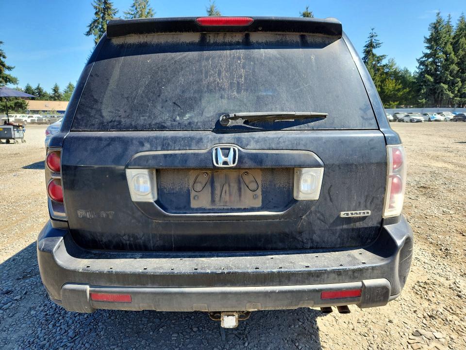 Photo 6 from auction – 2006 HONDA PILOT with VIN 2HKYF18426H534191
