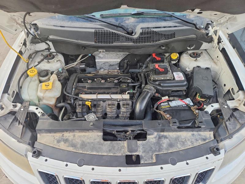 Photo 12 from auction – 2014 JEEP COMPASS with VIN 1C4NJDBB0ED623031