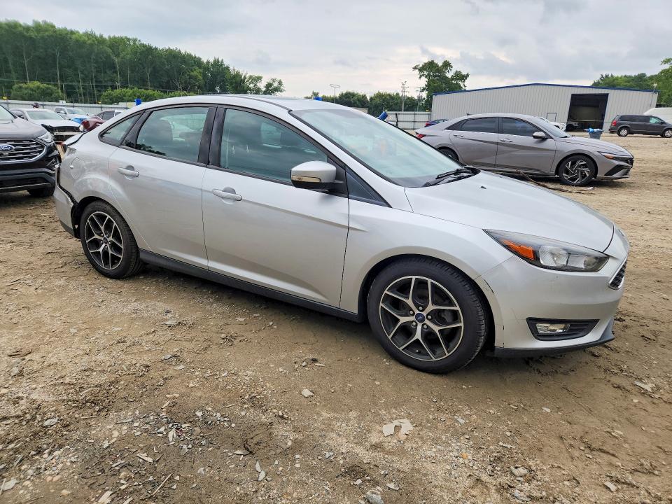 Photo 4 from auction – 2018 FORD FOCUS with VIN 1FADP3H25JL234354