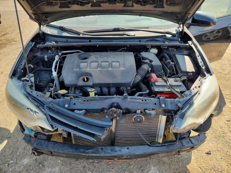 Photo 11 from auction – 2014 TOYOTA COROLLA with VIN 5YFBURHE0EP011580