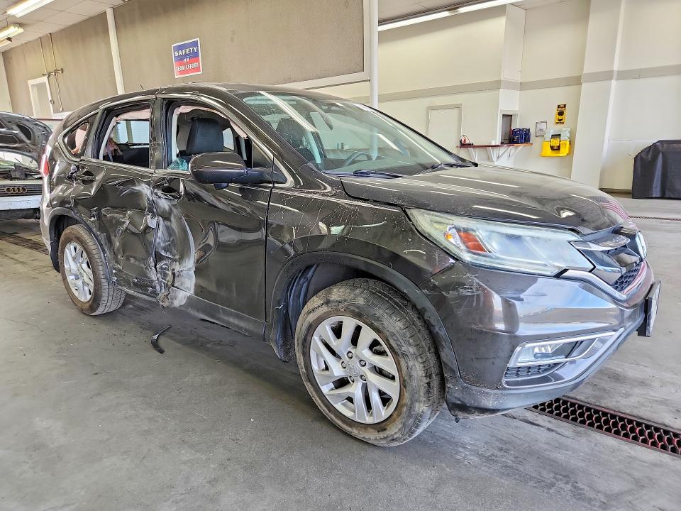 Photo 4 from auction – 2015 HONDA CR-V with VIN 2HKRM4H53FH662489