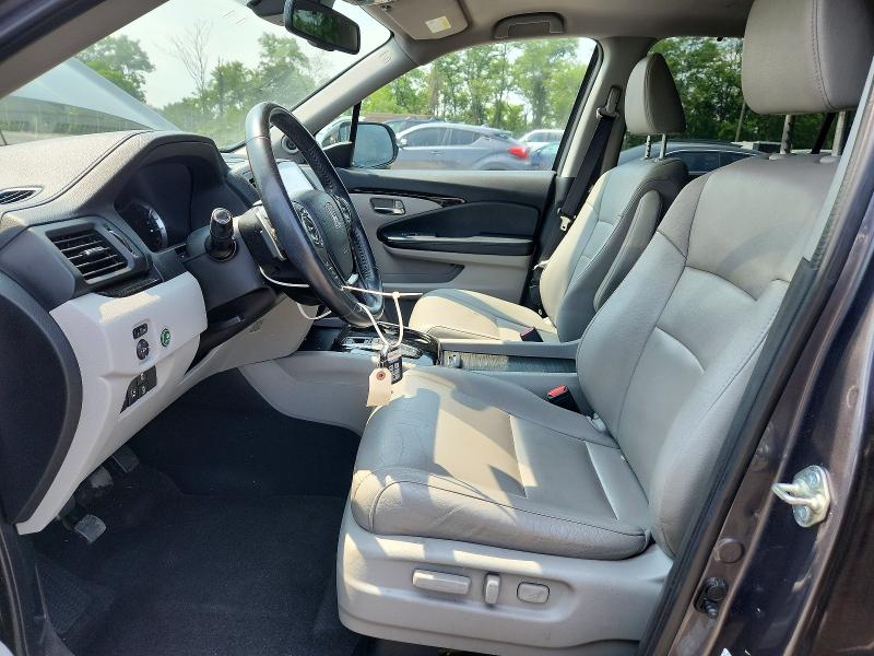 Photo 7 from auction – 2017 HONDA PILOT with VIN 5FNYF6H91HB009990
