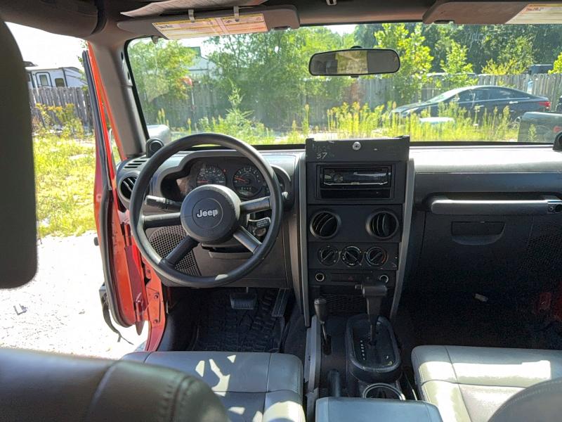 Photo 9 from auction – 2009 JEEP WRANGLER with VIN 1J4FA24149L770116