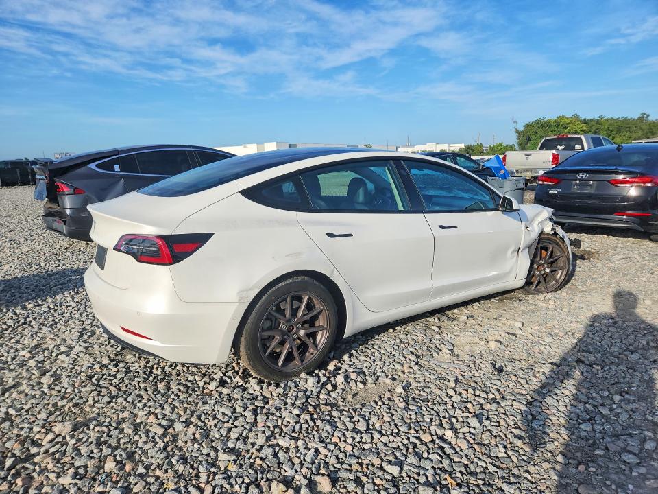 Photo 3 from auction – 2021 TESLA MODEL 3 with VIN 5YJ3E1EA3MF047522