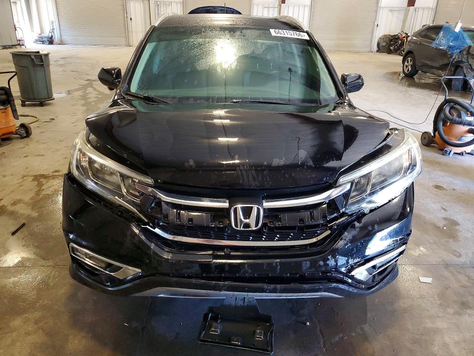 Photo 5 from auction – 2015 HONDA CR-V with VIN 2HKRM4H75FH659157