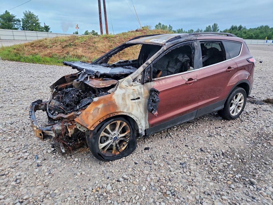 FORD ESCAPE 2018 with VIN 1FMCU9GD6JUC95240 - Photo from auction