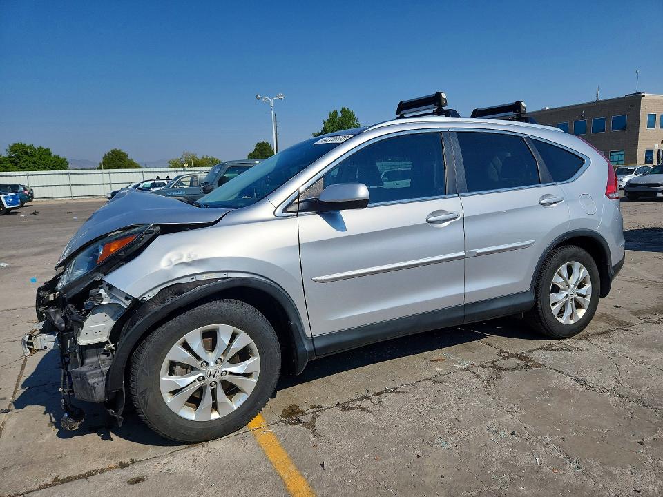 HONDA CR-V 2014 with VIN 5J6RM4H77EL091370 - Photo from auction