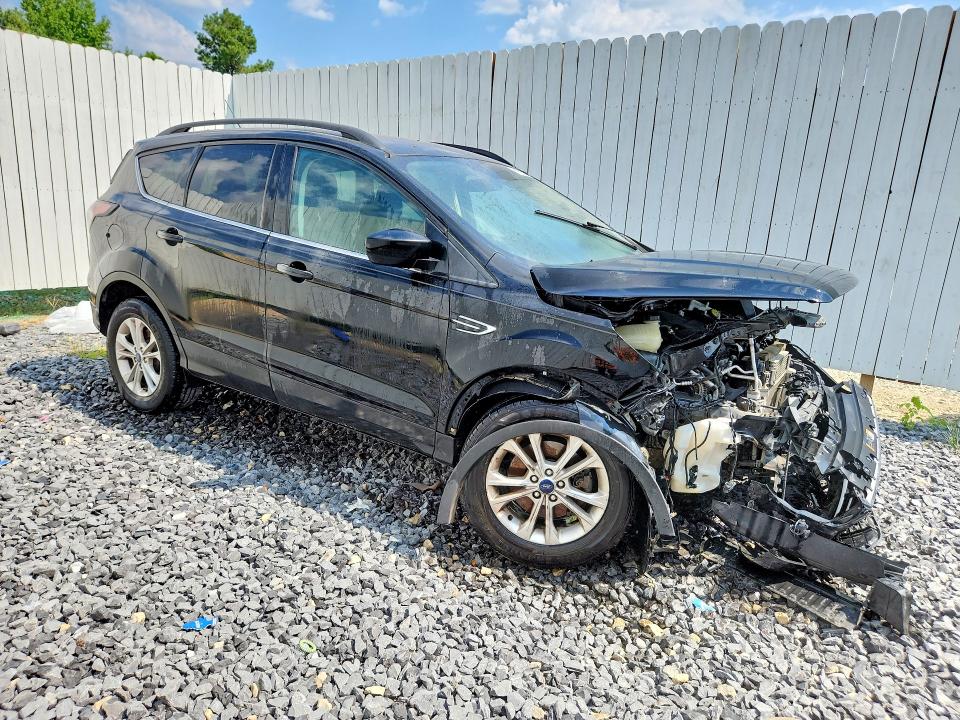 Photo 4 from auction – 2018 FORD ESCAPE with VIN 1FMCU9GD9JUD14637
