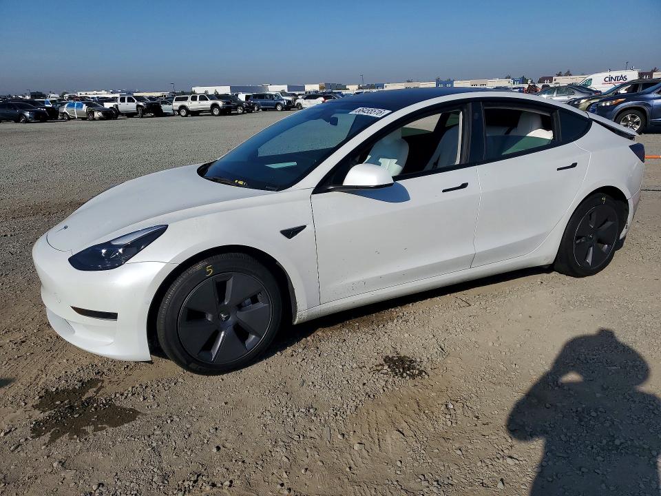 TESLA MODEL 3 2022 with VIN 5YJ3E1EA9NF357661 - Photo from auction