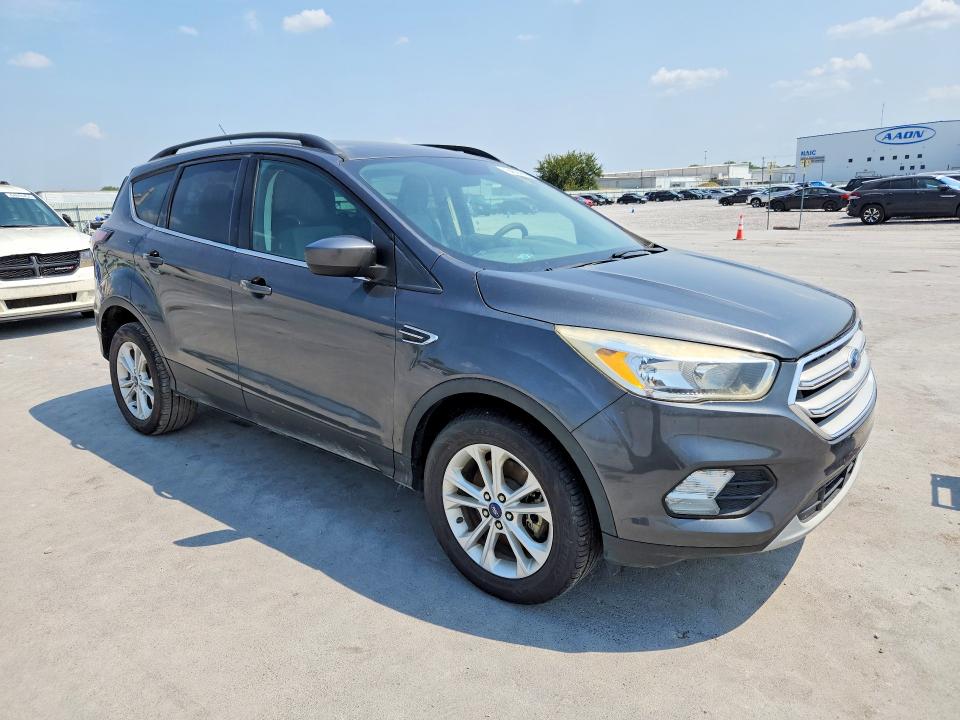 Photo 4 from auction – 2018 FORD ESCAPE with VIN 1FMCU9GD8JUB36235