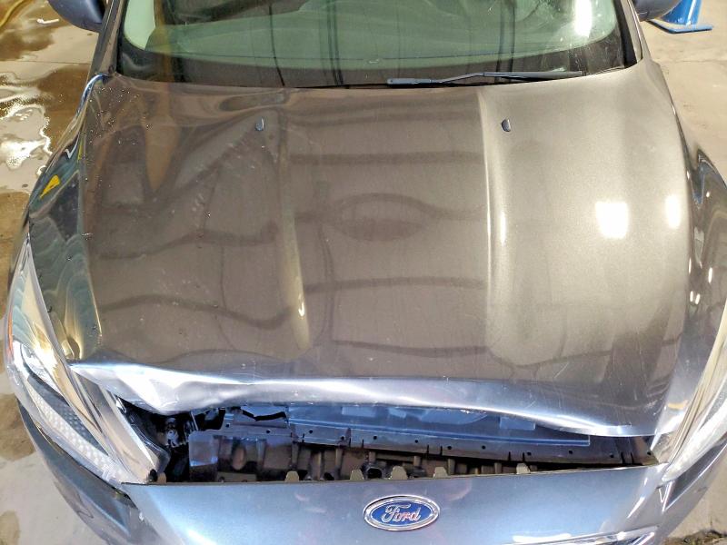 Снимка 11 от търг – 2018 FORD FOCUS с VIN 1FADP3E20JL309479