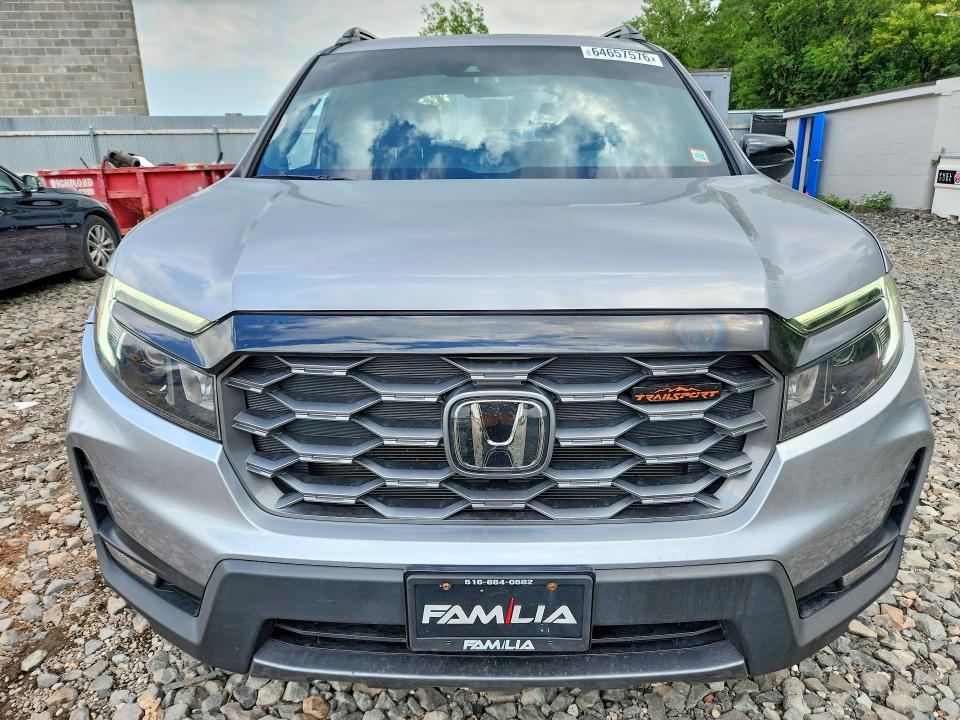 Снимка 5 от търг – 2023 HONDA PASSPORT с VIN 5FNYF8H65PB040871