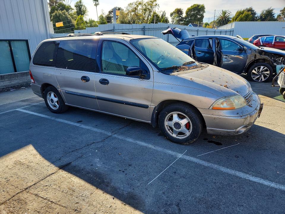 Photo 4 from auction – 2003 FORD WINDSTAR with VIN 2FMDA51443BB60877