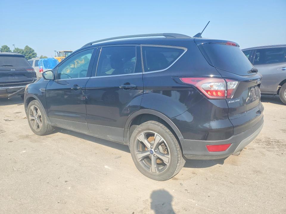 Photo 2 from auction – 2018 FORD ESCAPE with VIN 1FMCU9HD0JUA91418