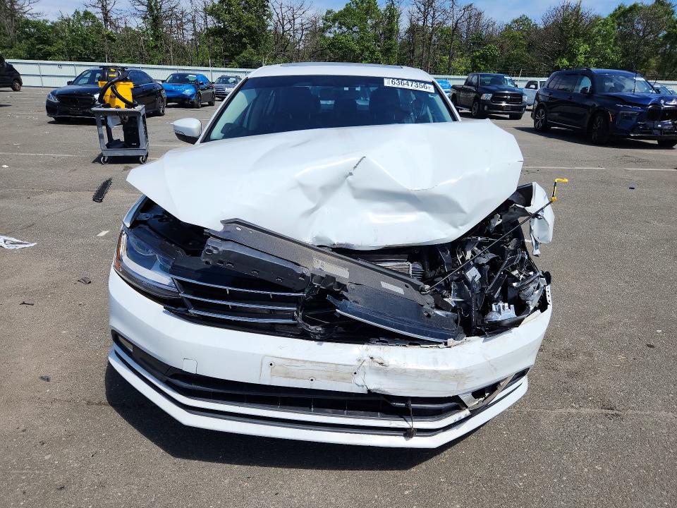 Photo 5 from auction – 2018 VOLKSWAGEN JETTA with VIN 3VWL17AJ2JM207303