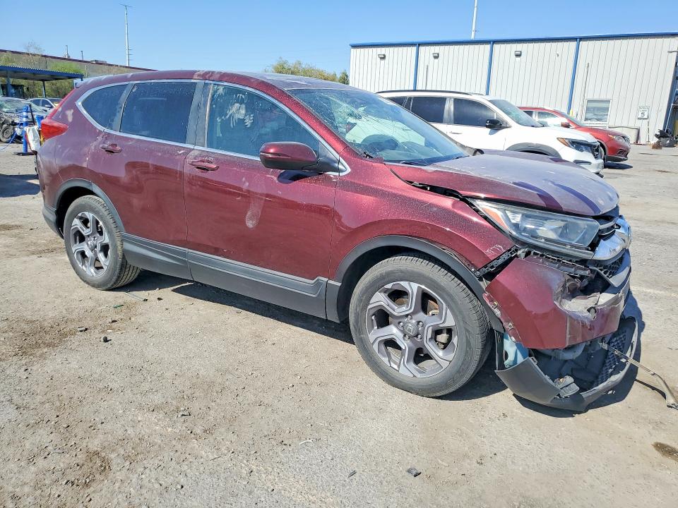 Photo 4 from auction – 2018 HONDA CR-V with VIN 7FARW1H50JE010563