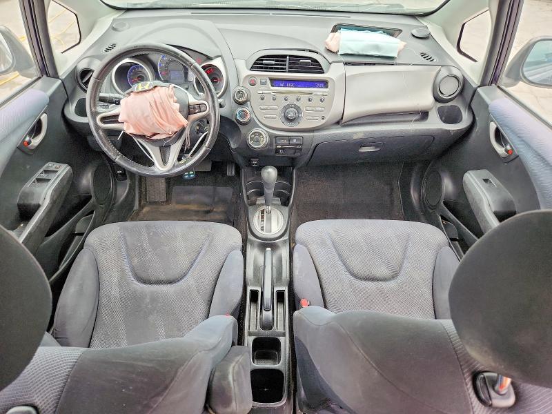 Photo 8 from auction – 2009 HONDA FIT with VIN JHMGE88499S075558