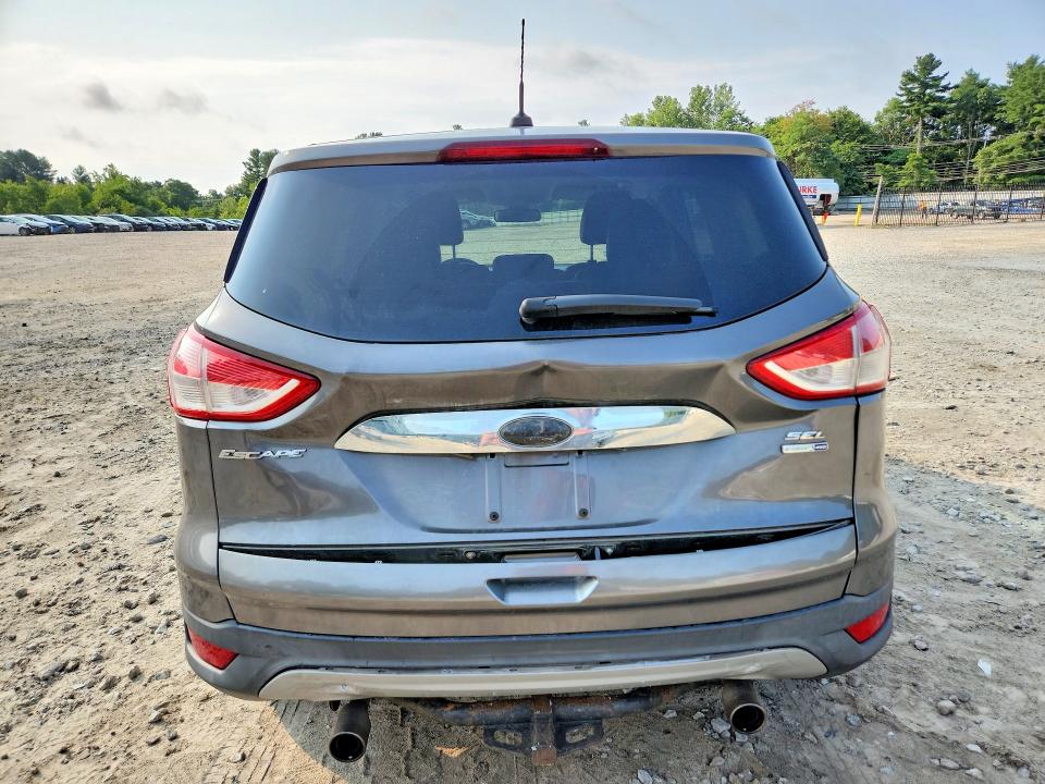 Photo 6 from auction – 2013 FORD ESCAPE with VIN 1FMCU9H96DUC90294