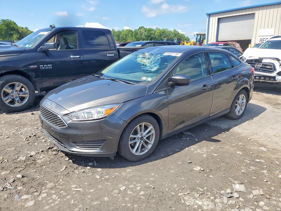 FORD FOCUS 2018 with VIN 1FADP3FE9JL214184 - Photo from auction