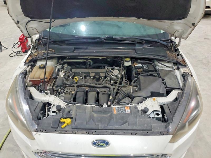Zdjęcie 11 z aukcji – 2017 FORD FOCUS z VIN 1FADP3N23HL268257
