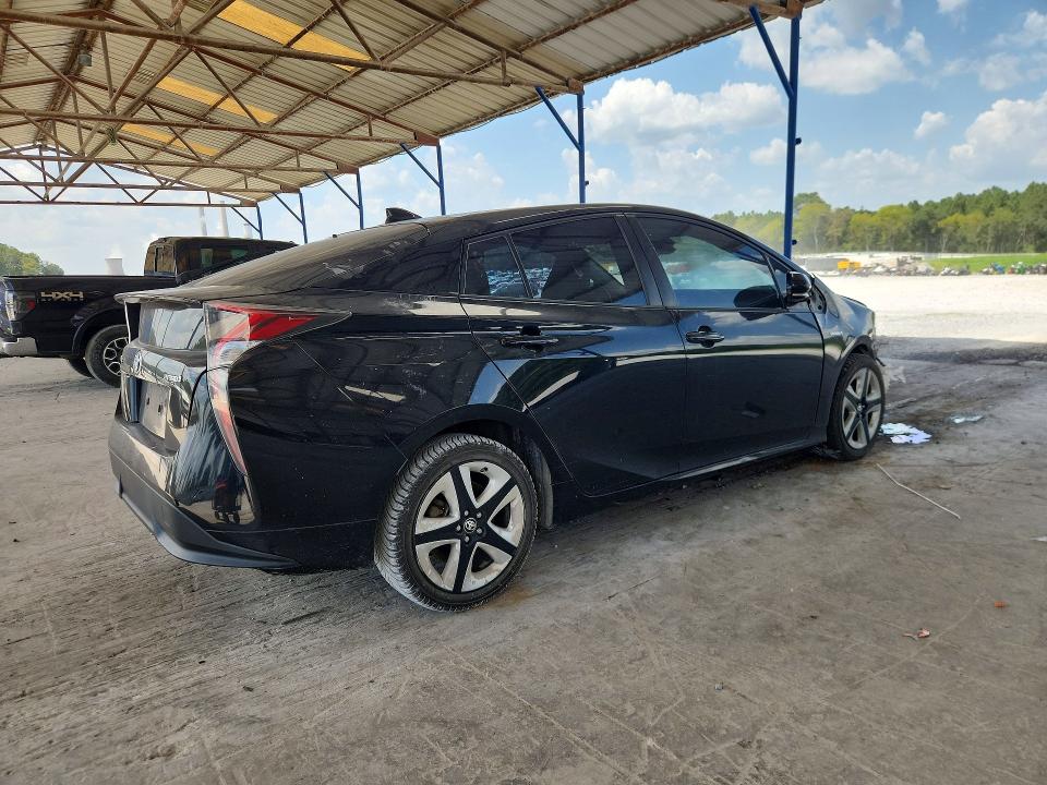 Photo 3 from auction – 2016 TOYOTA PRIUS with VIN JTDKARFUXG3028966