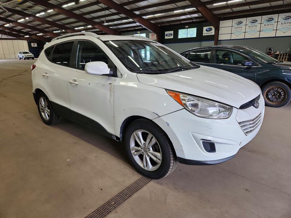 Photo 4 from auction – 2011 HYUNDAI TUCSON with VIN KM8JUCAC1BU261664