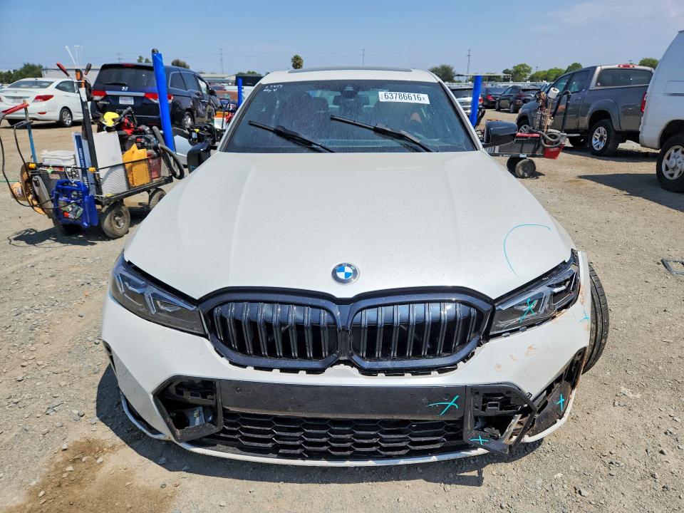 Photo 5 from auction – 2026 BMW 330I with VIN 3MW69CW06T8F89409