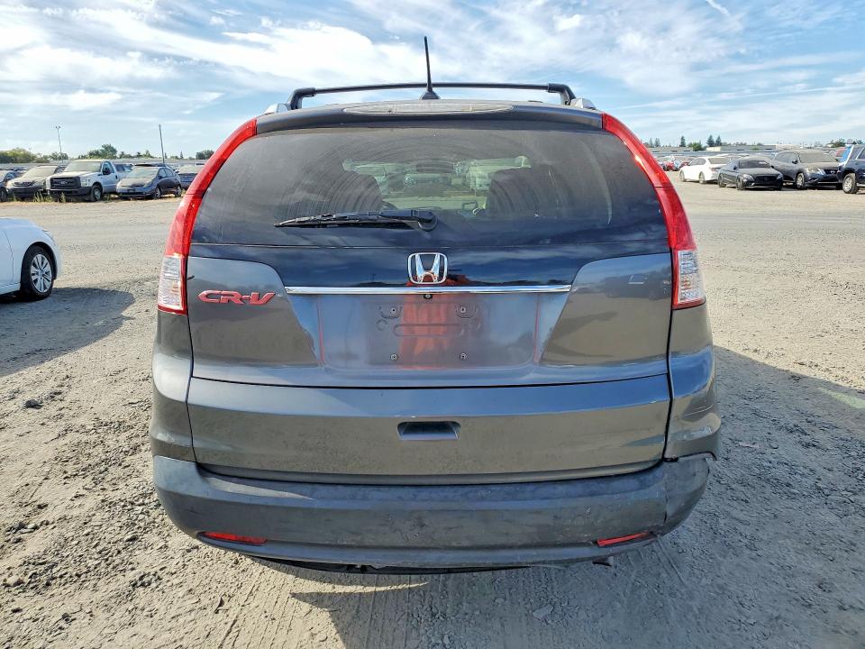 Photo 6 from auction – 2014 HONDA CR-V with VIN 2HKRM3H79EH529309