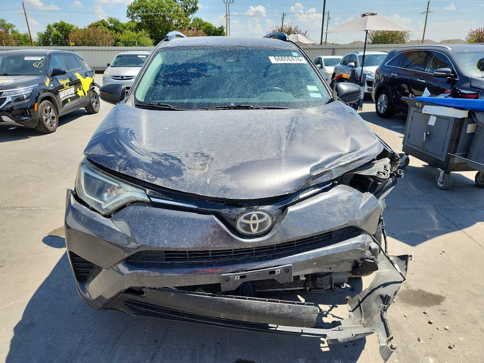 Photo 5 from auction – 2017 TOYOTA RAV4 with VIN JTMZFREV0HJ710102
