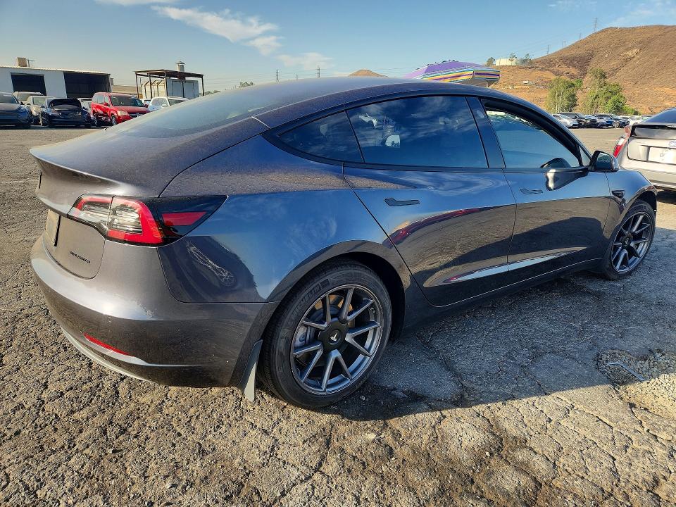 Photo 3 from auction – 2021 TESLA MODEL 3 with VIN 5YJ3E1EB3MF939147