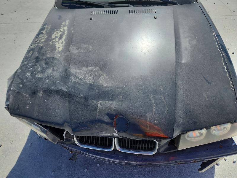 Photo 11 from auction – 1995 BMW 325 with VIN WBABJ6329SJD44350