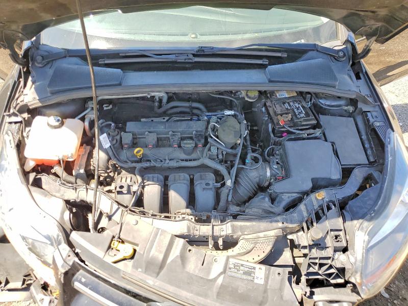 Photo 11 from auction – 2014 FORD FOCUS with VIN 1FADP3J20EL159983