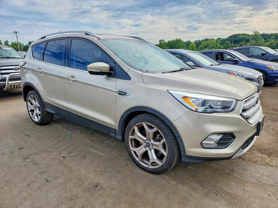 Photo 4 from auction – 2018 FORD ESCAPE with VIN 1FMCU0J98JUA54652