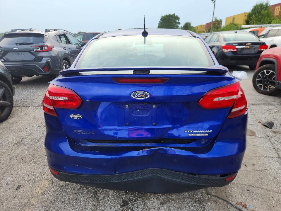 Photo 6 from auction – 2015 FORD FOCUS with VIN 1FADP3J24FL339520