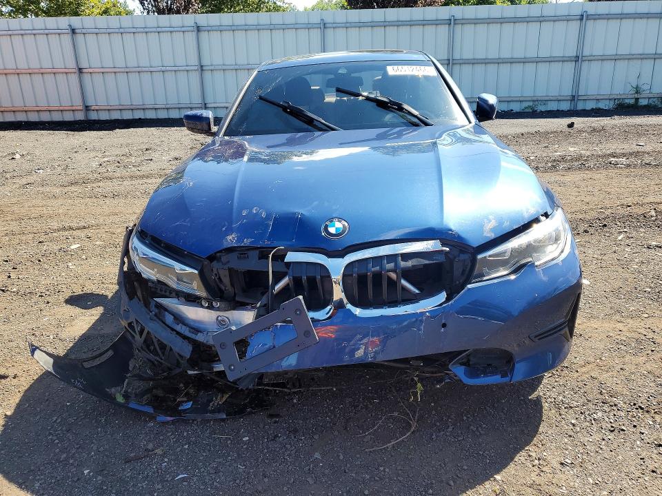 Photo 5 from auction – 2021 BMW 330XI with VIN 3MW5R7J05M8C21654