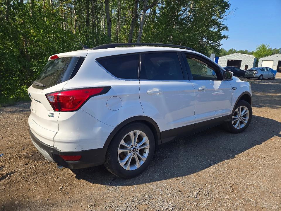 Photo 3 from auction – 2019 FORD ESCAPE with VIN 1FMCU9HD9KUC39129