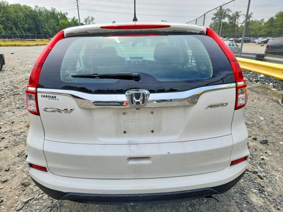 Photo 6 from auction – 2015 HONDA CR-V with VIN 5J6RM4H30FL101350