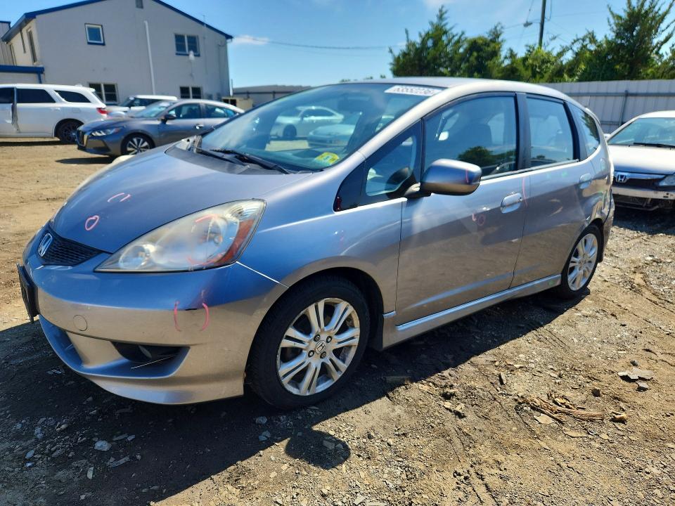 HONDA FIT 2009 with VIN JHMGE88439S013458 - Photo from auction