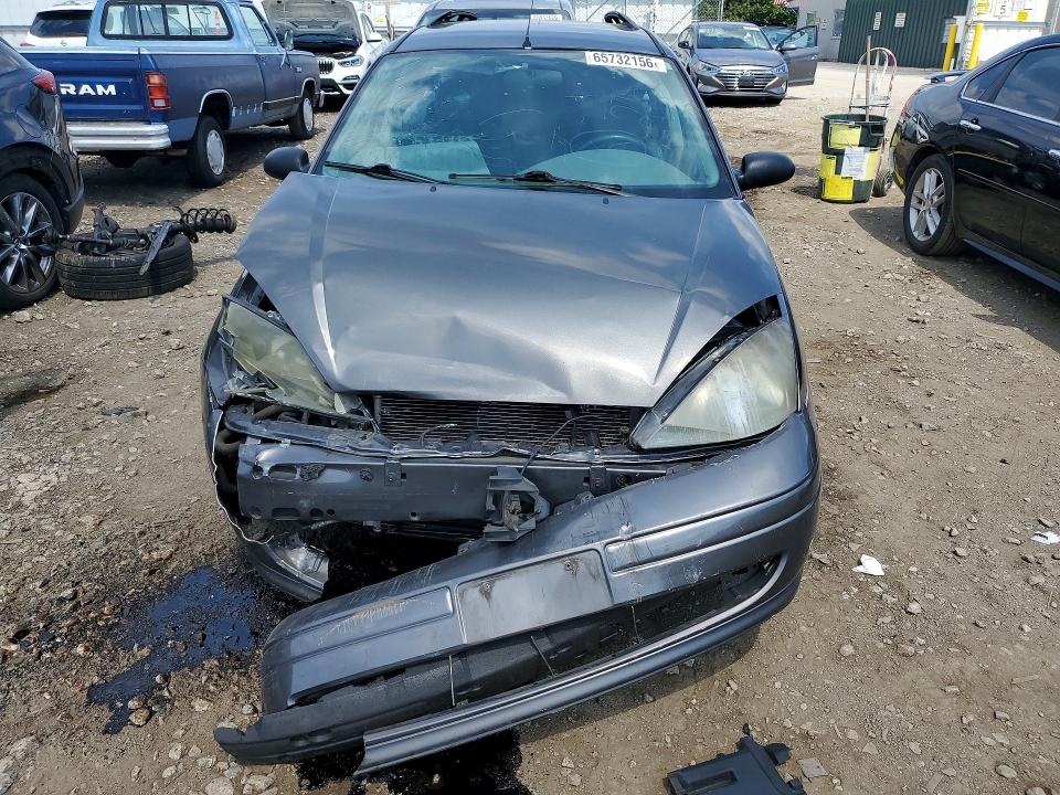 Photo 5 from auction – 2004 FORD FOCUS with VIN 1FAFP36Z64W120326
