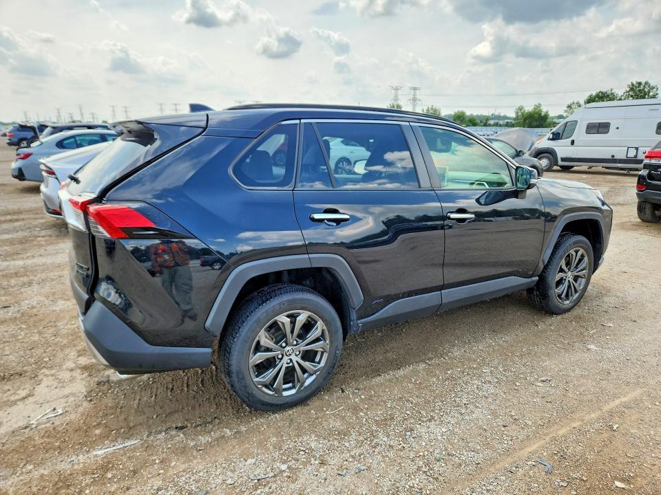 Photo 3 from auction – 2022 TOYOTA RAV4 with VIN JTMD6RFV0ND059296