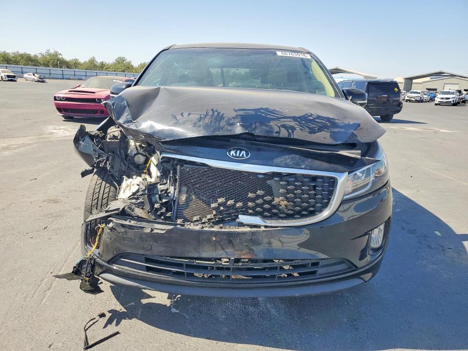 Photo 5 from auction – 2015 KIA SEDONA with VIN KNDMC5C18F6079076