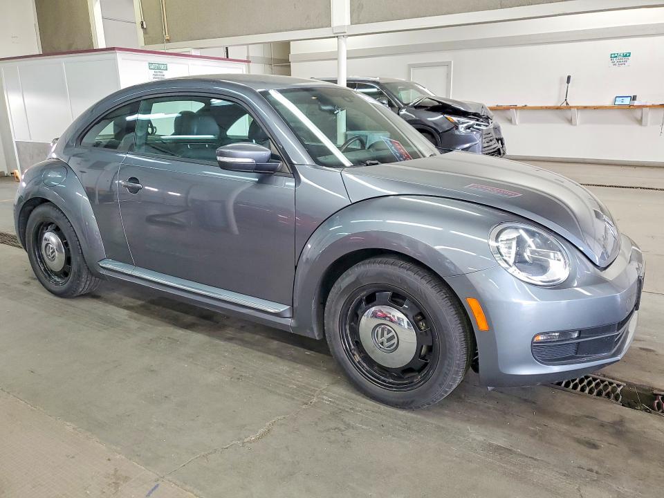 Photo 4 from auction – 2016 VOLKSWAGEN BEETLE with VIN 3VWJ17AT5GM605817