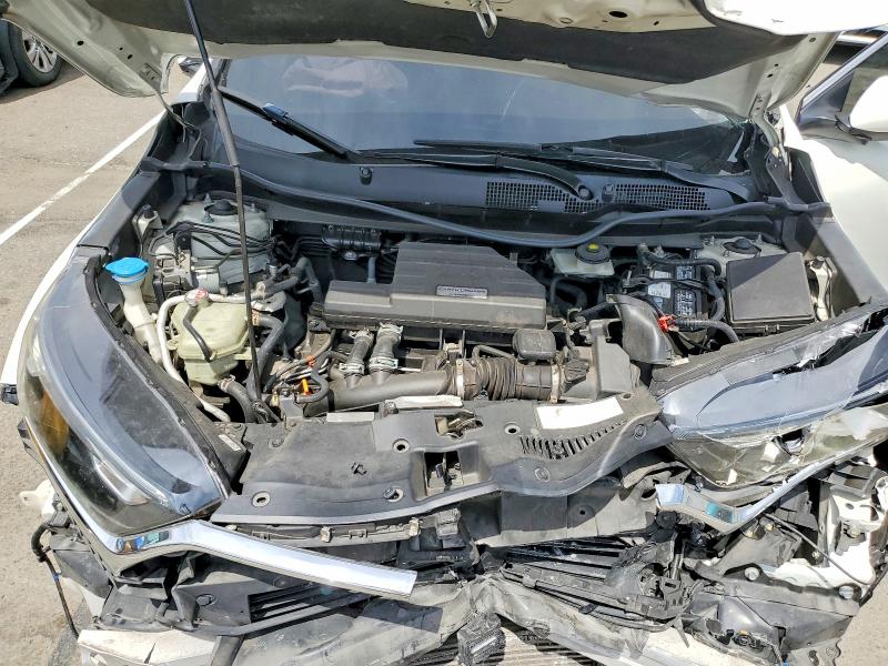 Photo 12 from auction – 2018 HONDA CR-V with VIN 2HKRW1H85JH516753