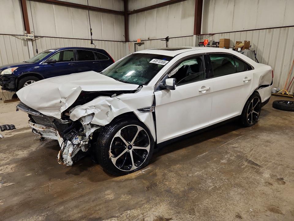FORD TAURUS 2015 with VIN 1FAHP2H85FG179274 - Photo from auction